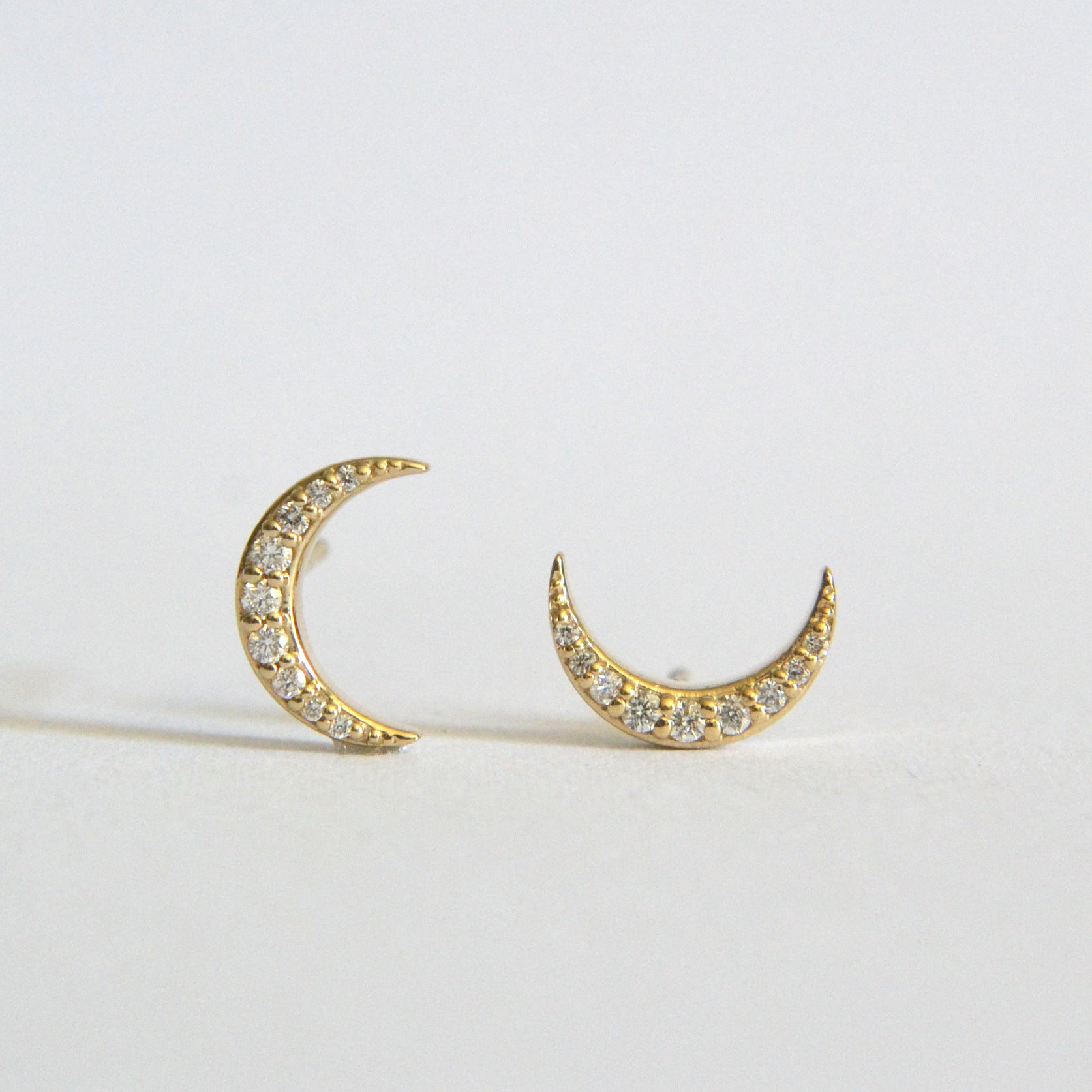 Diamond moon stud earrings
