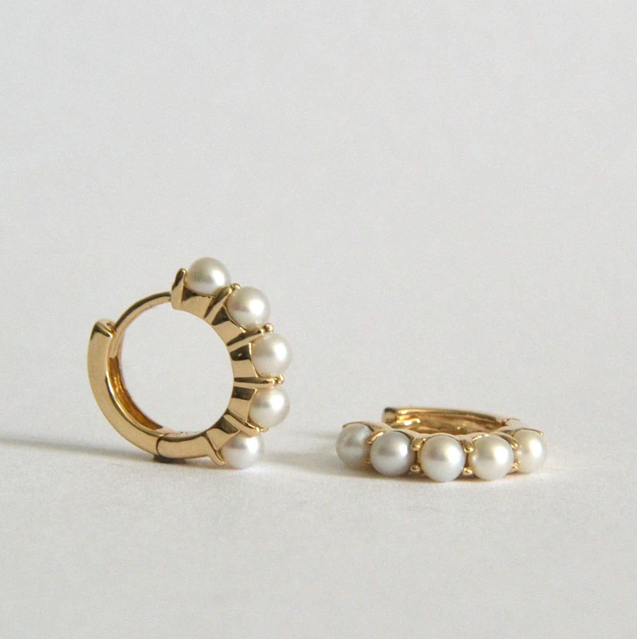 14k pearl huggie hoops