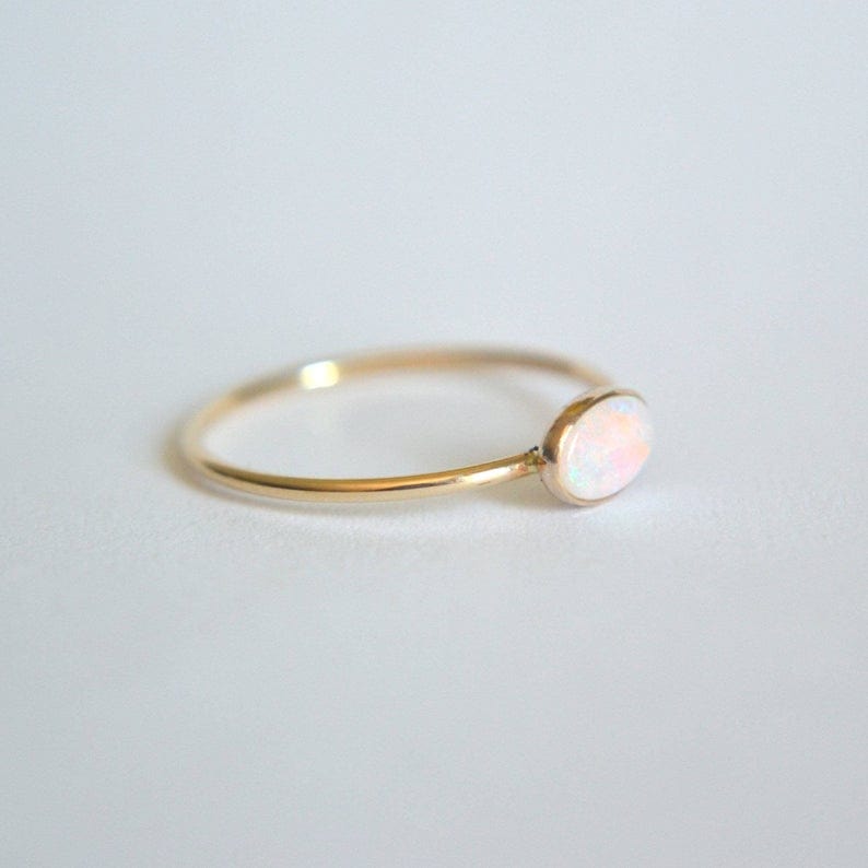 Dainty oval opal ring